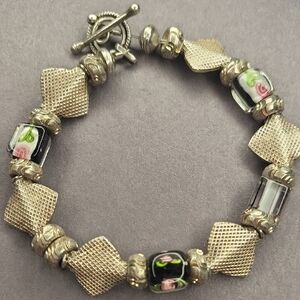 Handcrafted Silver-Tone Black Glass Bead Bracelet with Pink Floral Accents